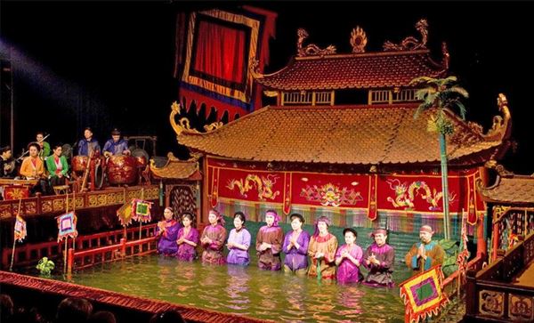 Saigon Evening Tour With Water Puppetry & Dinner Cruise 